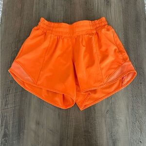 Lululemon Hotty Hot LR Shorts 4” Sz 2 *highlighter orange*